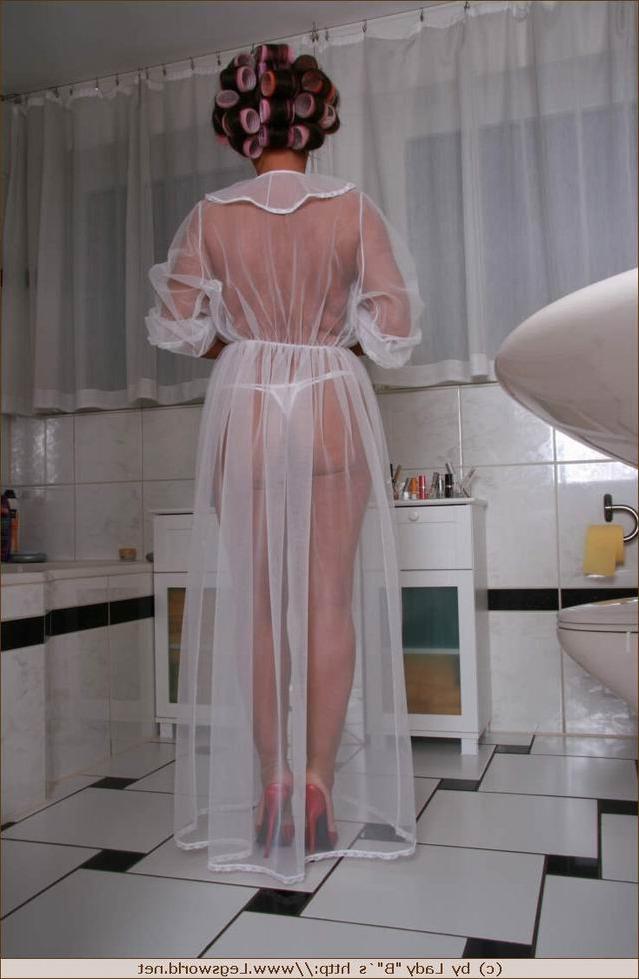 12P Leggy lady wearing white glamour lingerie
