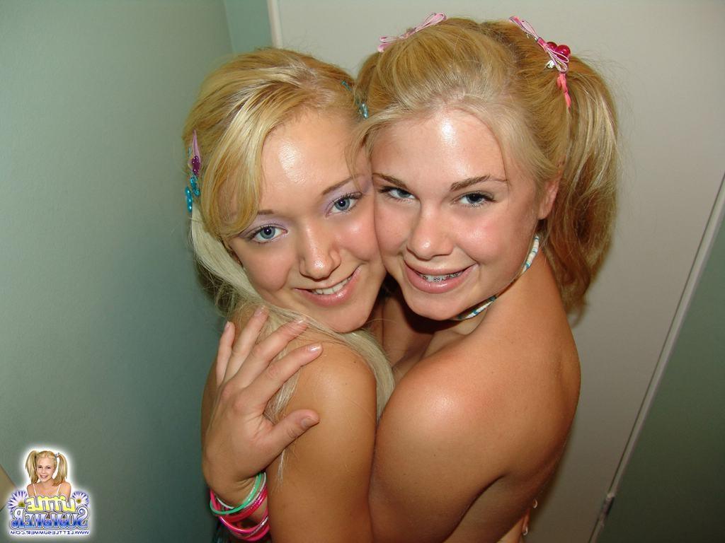 15P Tiny titted teen lesbian GFs fingering their pussies in bathroom