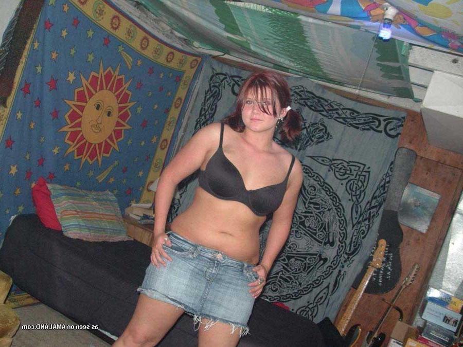 12P Taking off her jeans miniskirt at home
