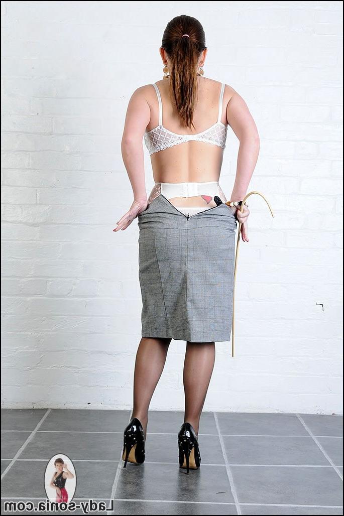 15P Kinky head mistress strips down to stockings and lingerie