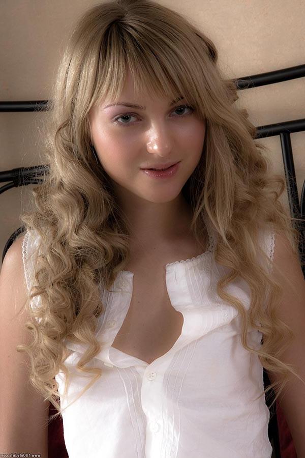 17P Beautiful curly young amateur lady playing with herself