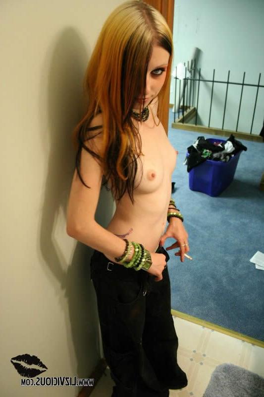18P Redhead goth chick fingers her pussy on the bathroom counter