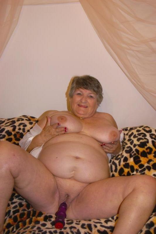 20P Horny fat mature loves to tease while playing with a dildo