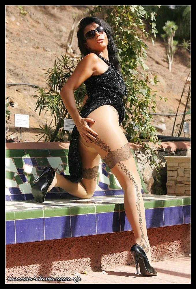 15P Glamorous babe wearing long dress and pantyhose at the park