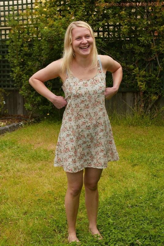 16P Long haired blonde shows her naked body in the backyard