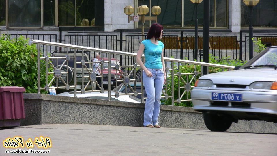 12P Red-haired chick wets her pants and changes outdoors flashing her pussy