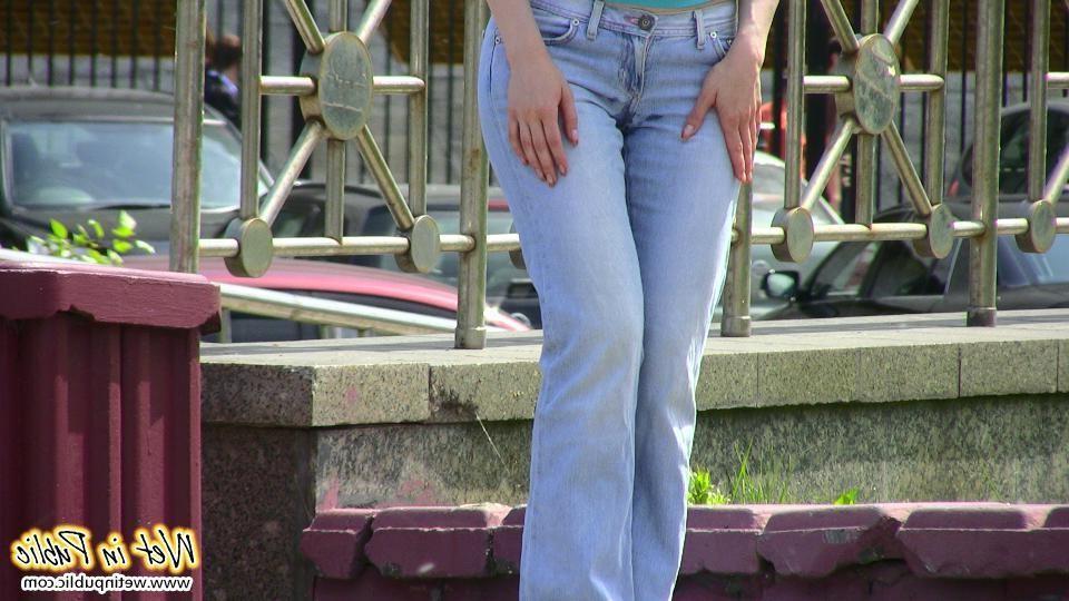 12P Red-haired chick wets her pants and changes outdoors flashing her pussy