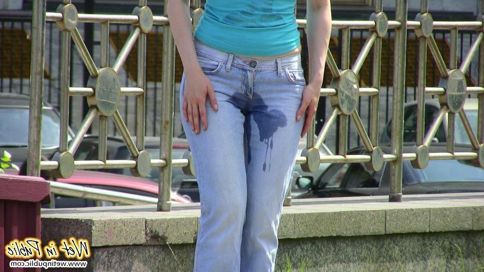 12P Red-haired chick wets her pants and changes outdoors flashing her pussy