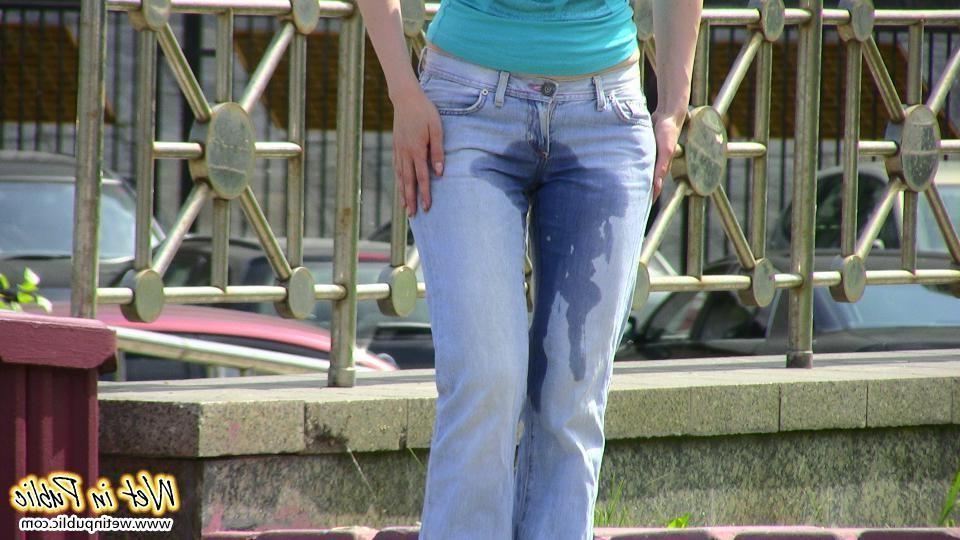 12P Red-haired chick wets her pants and changes outdoors flashing her pussy