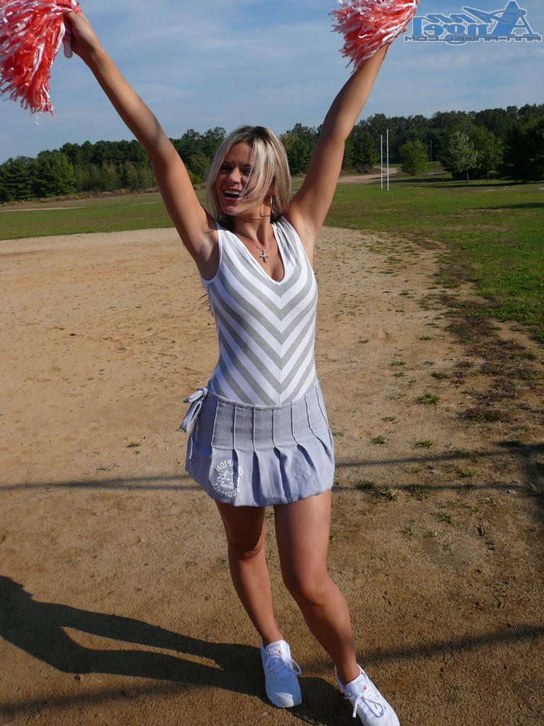 15P Anna outdoors in a miniskirt