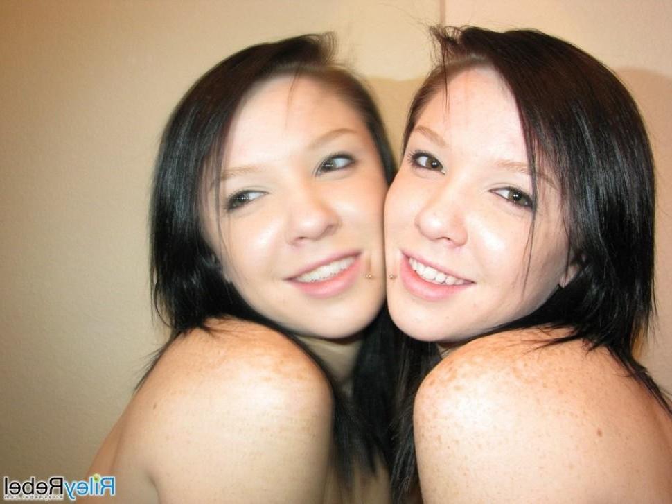 15P Tiny titted eighteen year old Riley Rebel slides off black thong