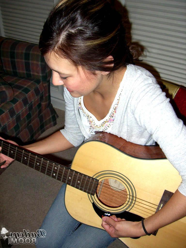 15P Guitar playing teen peels off her hot little thong