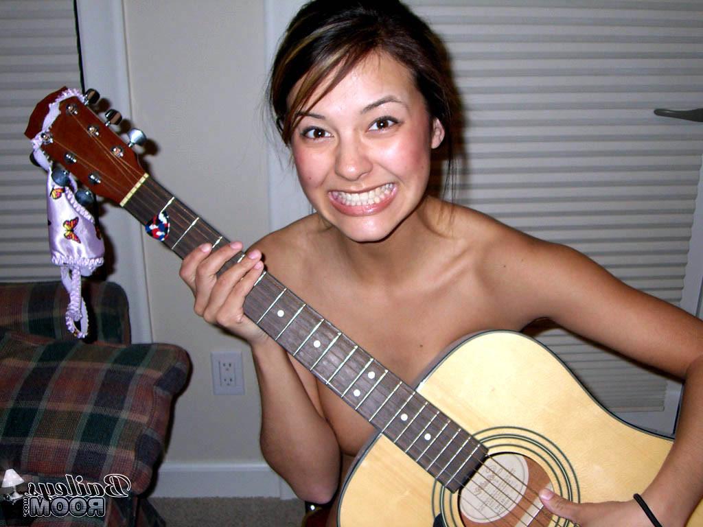 15P Guitar playing teen peels off her hot little thong