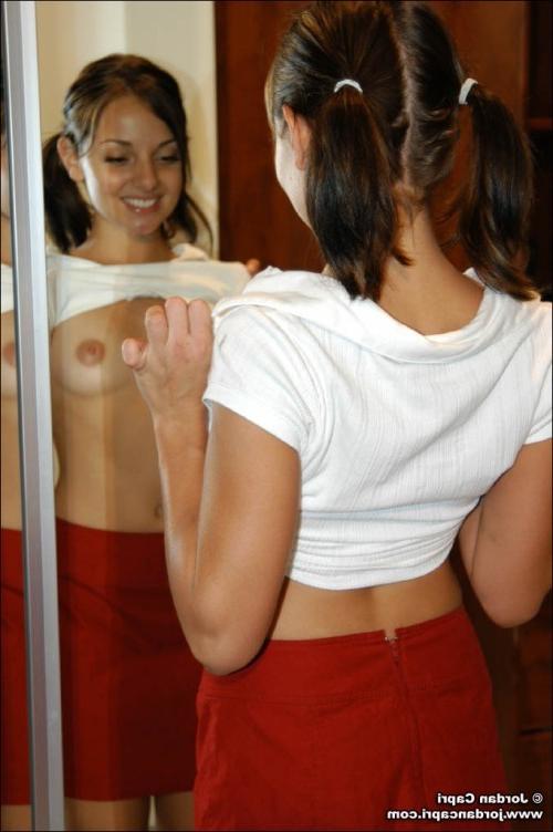 9P Brunette teen stripping in front of a mirror