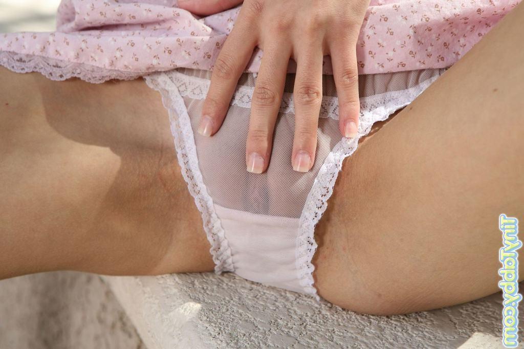 15P Tiny titted eighteen year old drops panties to spread her pussy