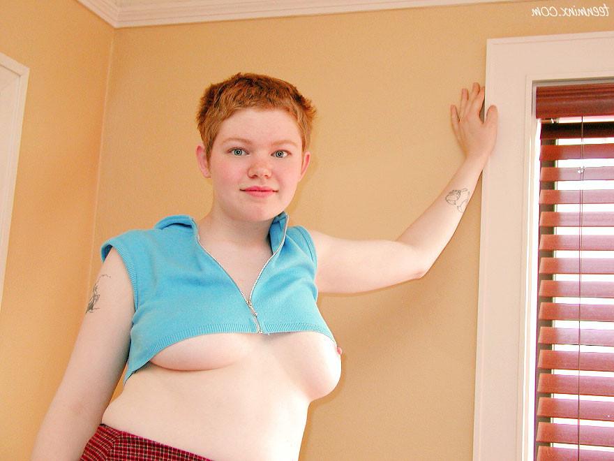 18P Short haired redhead teen cutie in a skirt shows her fire crotch