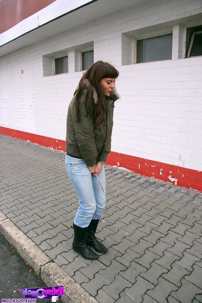 14P Horny brunette teenie sucking a cock on a public toilet