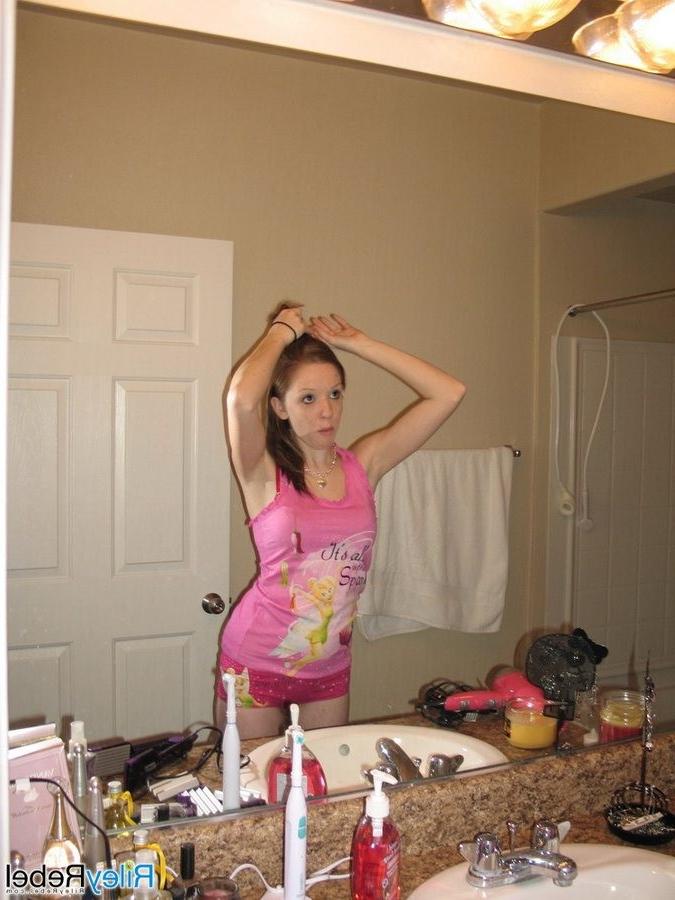 16P Redhead Riley Rebel gets ready in the bathroom