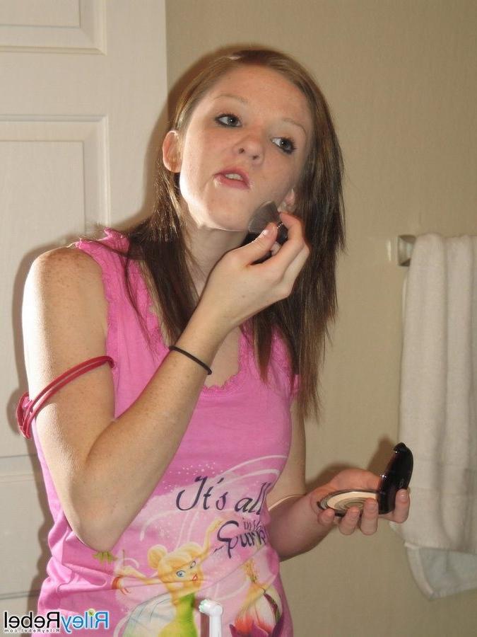 16P Redhead Riley Rebel gets ready in the bathroom