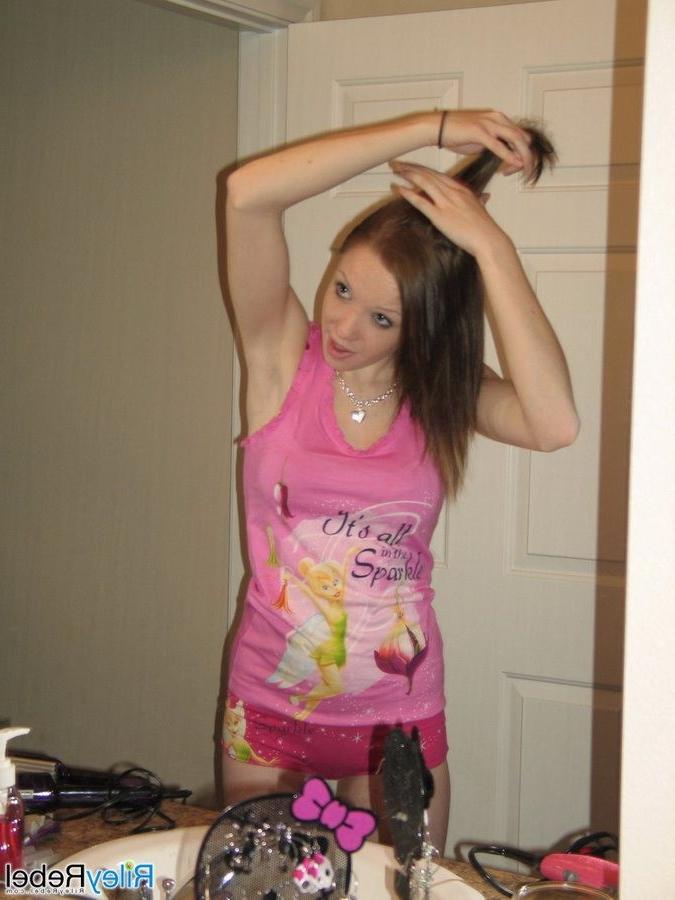 16P Redhead Riley Rebel gets ready in the bathroom