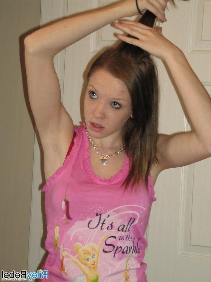 16P Redhead Riley Rebel gets ready in the bathroom