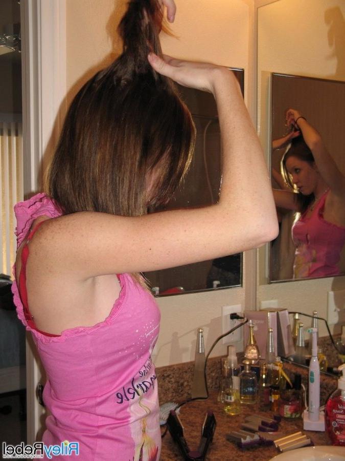 16P Redhead Riley Rebel gets ready in the bathroom