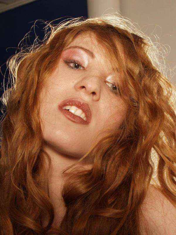 15P Amateur curly redhead naked at home