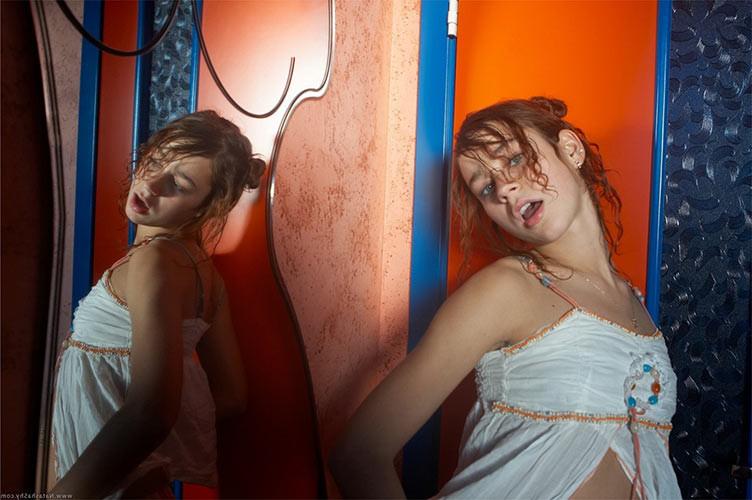 17P Beautiful curly redhead teenie pulling down all her garments