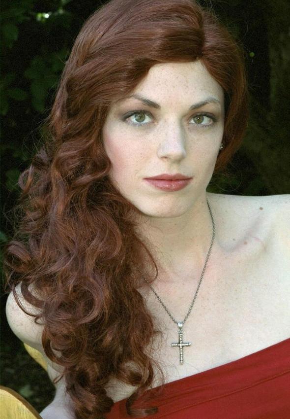 20P Curly redhead cutie showing upskirt