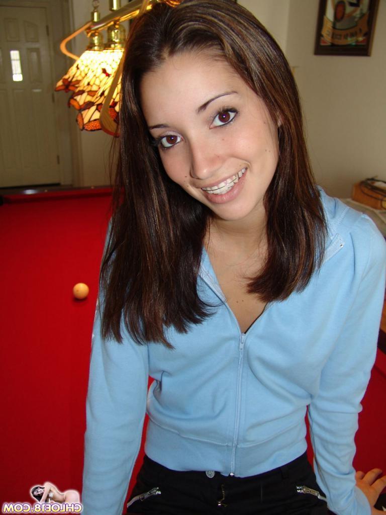 16P A dark haired teenie touching her pussy in panties