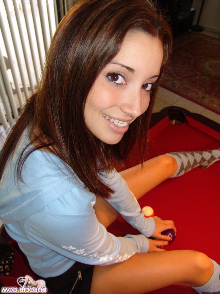 16P A dark haired teenie touching her pussy in panties
