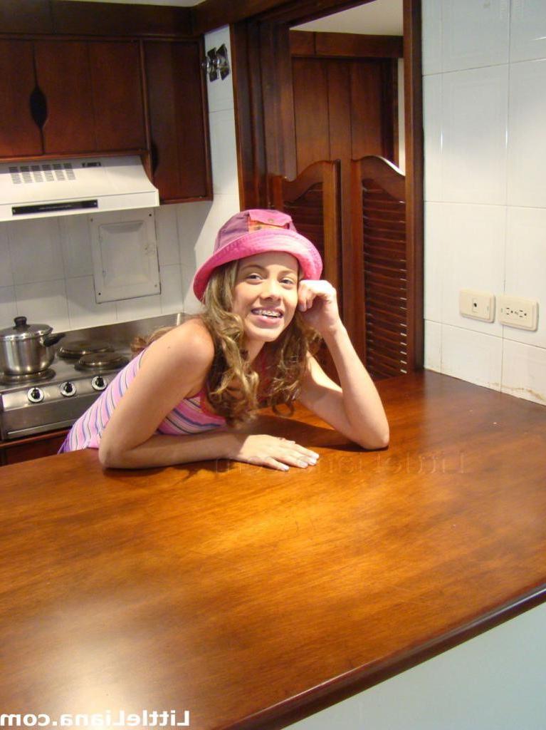 16P A cute curly teen in a short skirt is teasing nice