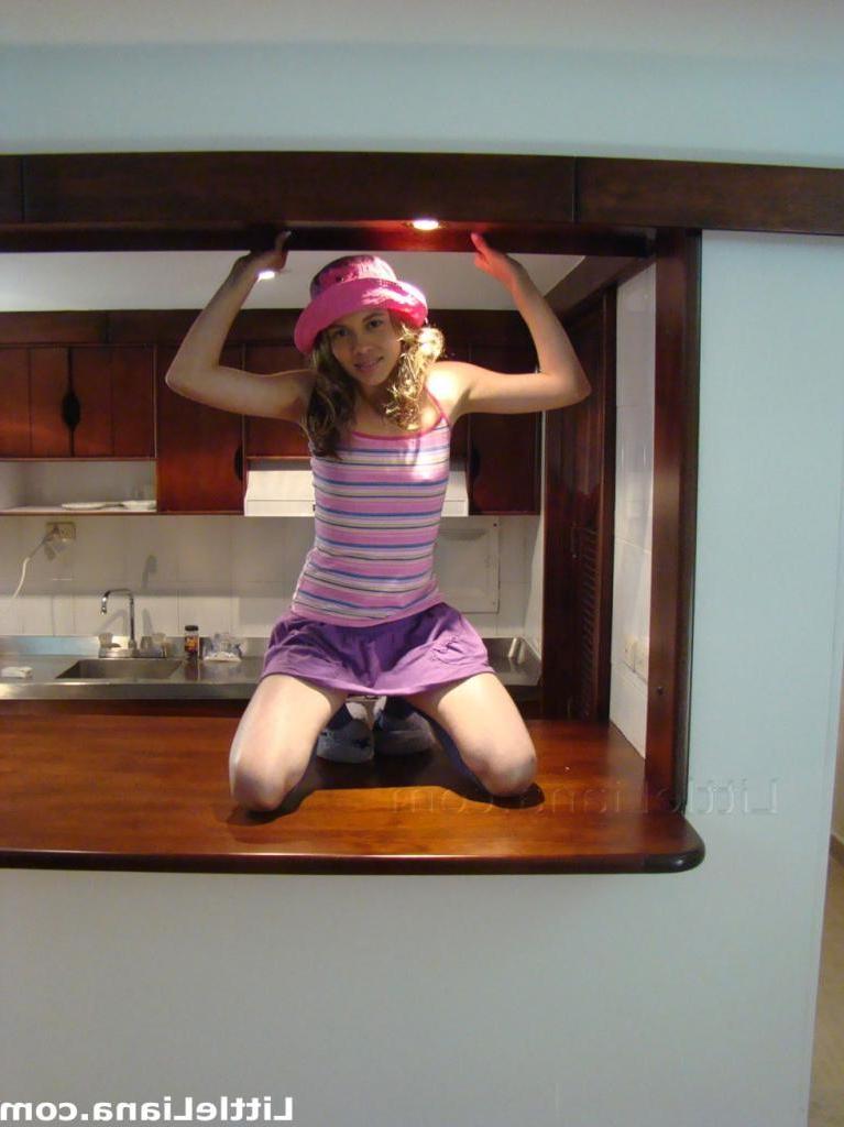 16P A cute curly teen in a short skirt is teasing nice