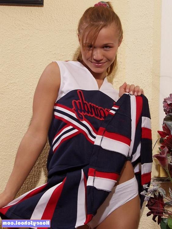 15P Teen cheerleader shows her panties and then takes them off