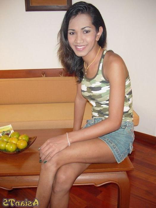 16P Huge ladyboy cock hanging from under her miniskirt