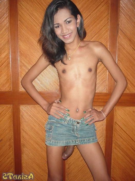 16P Huge ladyboy cock hanging from under her miniskirt