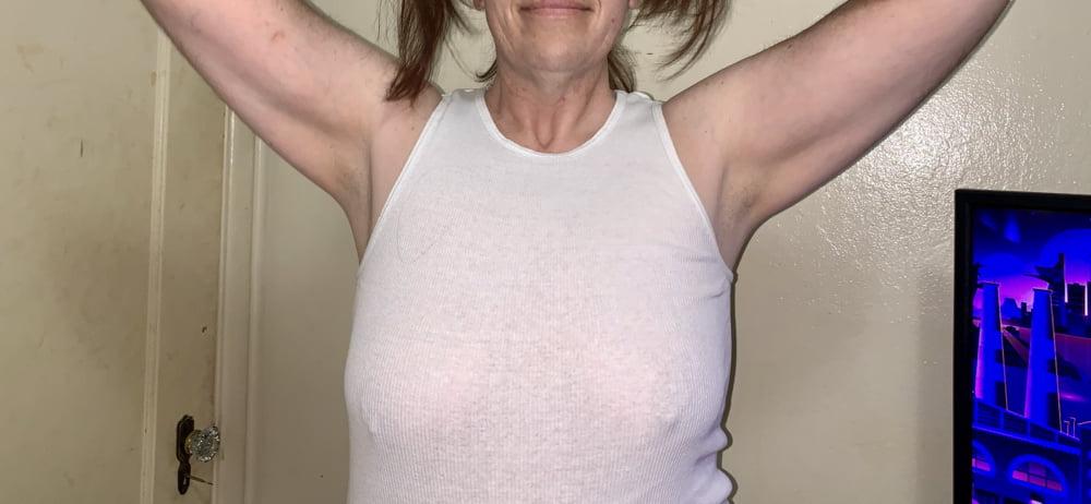 19P Wife lifting her shirt.