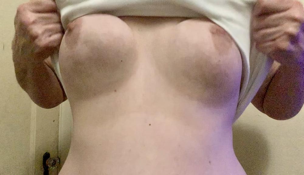 19P Wife lifting her shirt.