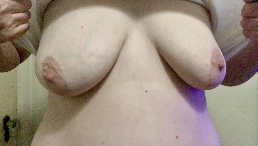 19P Wife lifting her shirt.