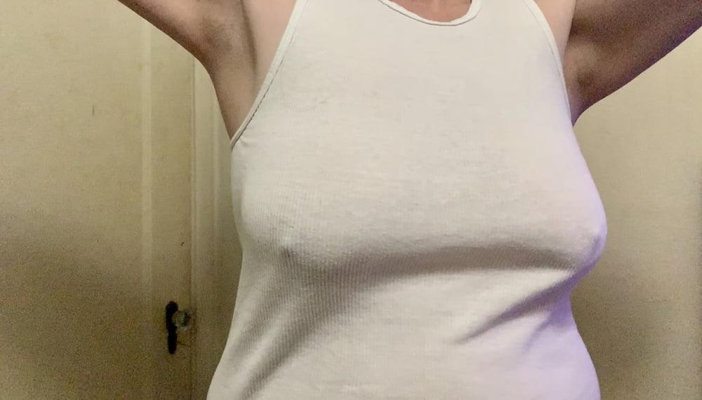 19P Wife lifting her shirt.