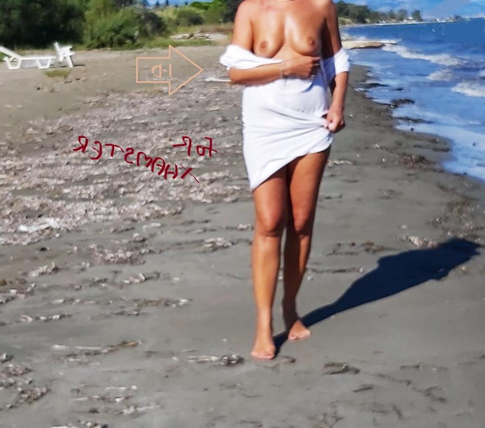 25P Greek wife teasing husband friends