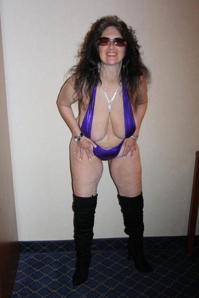 25P Tinja Expands A Purple Thong Monokini
