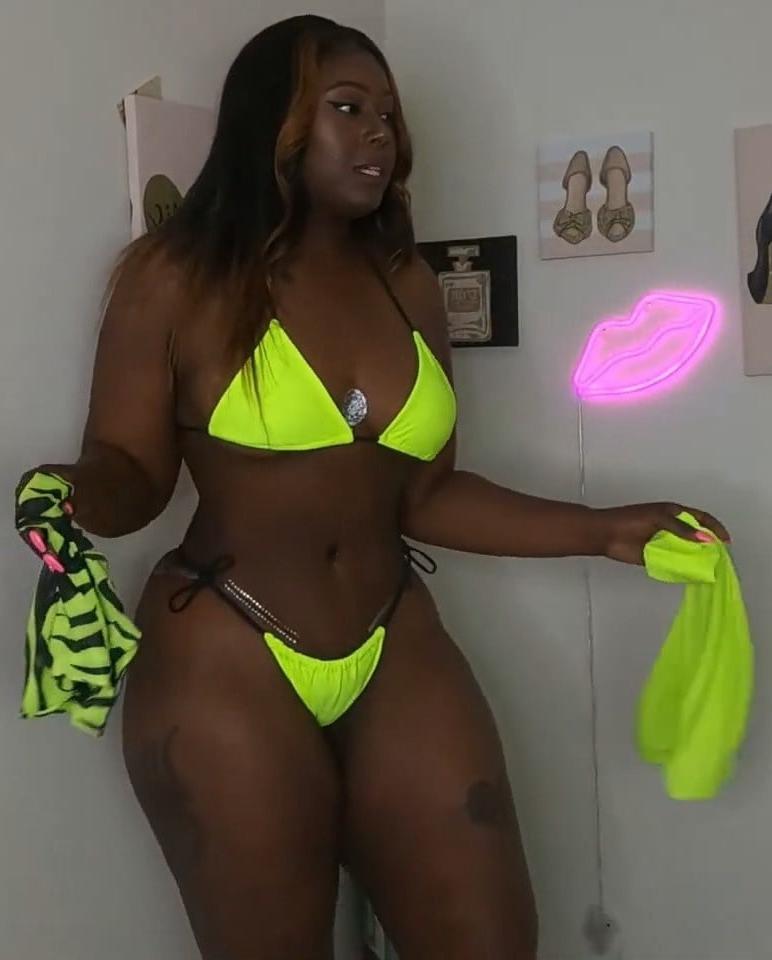 17P Beautiful sexy brown skinned thong bikini woman