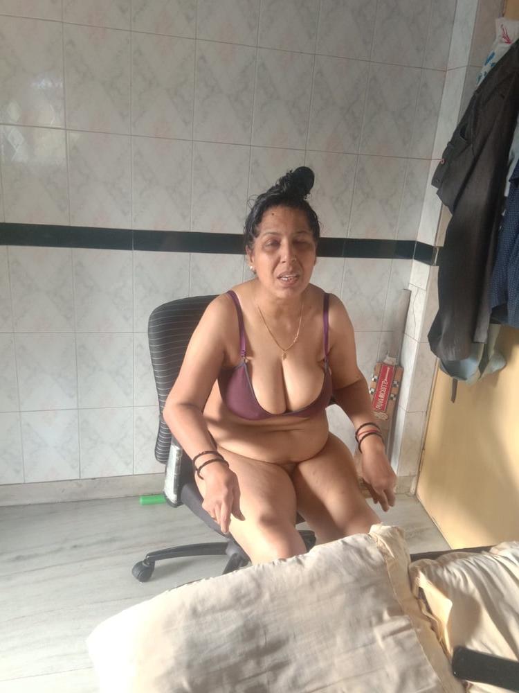 23P Mature woman bathing