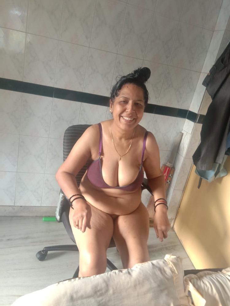 23P Mature woman bathing