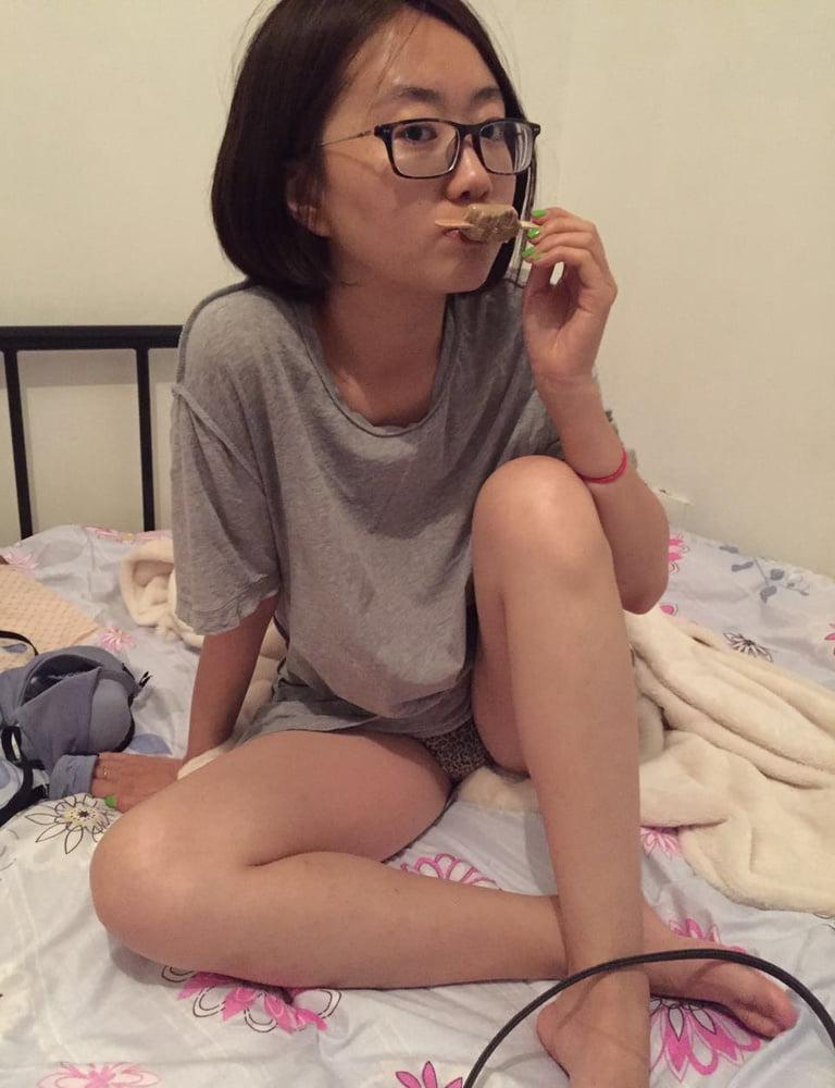 16P Asia girl with glasses 16