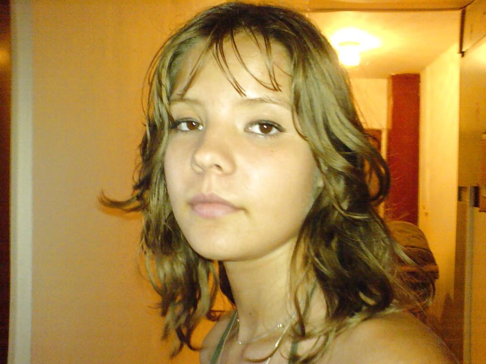 25P Cute brunette on the beach