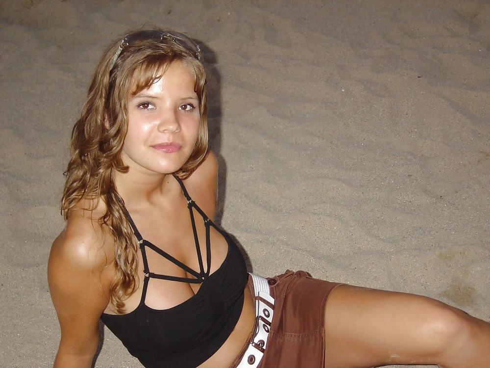 25P Cute brunette on the beach