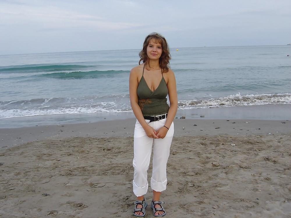 25P Cute brunette on the beach