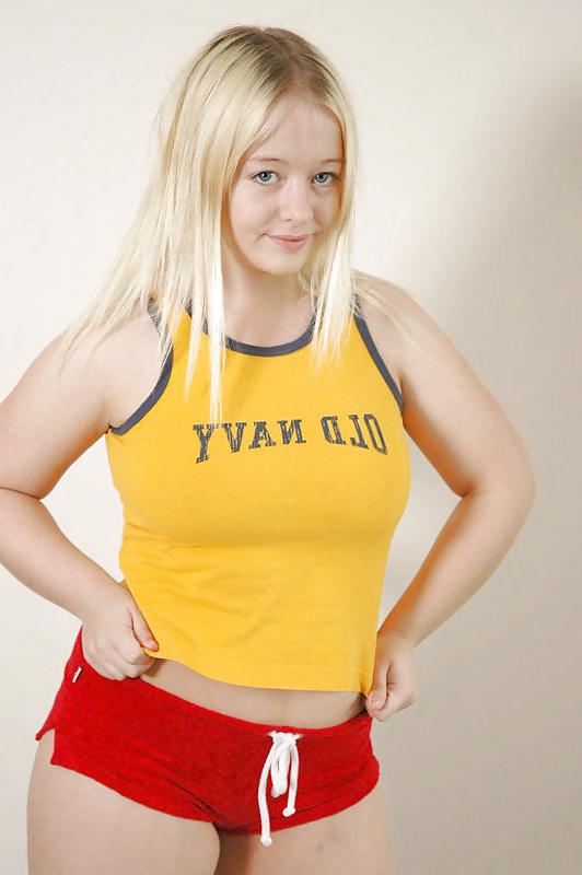 24P Chubby blonde getting out of her shorts and t-shirt
